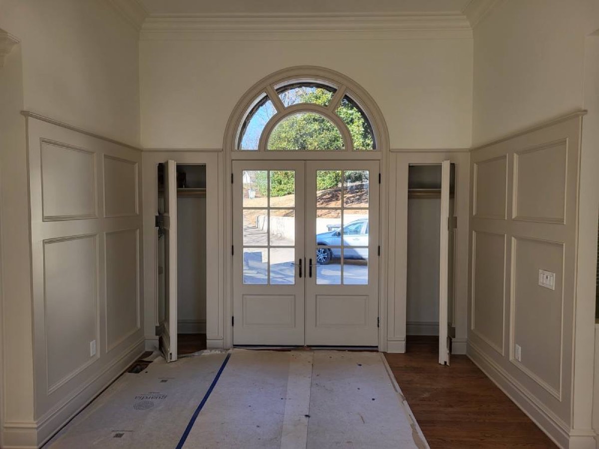 Entrance foyer with custom millwork and panel molding